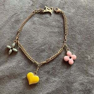 Louis Vuitton Gold tone Bracelet with Charms